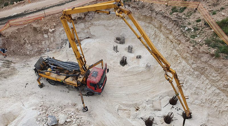 ביצוע גשר מערבי מעל וואדי ענבה והרחבת כביש 4 ושיקום אנדרטת הצנחנים בפארק הטכנולוגי במודיעין.